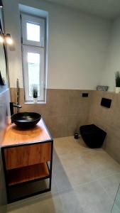 Łazienka w obiekcie GRYF Apartamenty Holiday Family