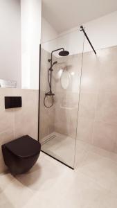 Łazienka w obiekcie GRYF Apartamenty Holiday Family