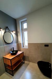 Łazienka w obiekcie GRYF Apartamenty Holiday Family