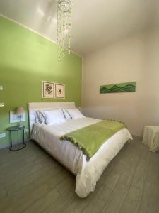 Un pat sau paturi într-o cameră la Cascina Beatrice Az Agrituristica
