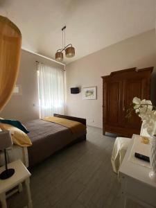 Postel nebo postele na pokoji v ubytování Bed & Breakfast Cascina Beatrice