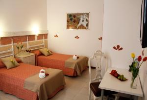 Posteľ alebo postele v izbe v ubytovaní 4Dreams Hotel Chimisay