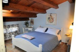 Postel nebo postele na pokoji v ubytování B&B Fonte Cugno