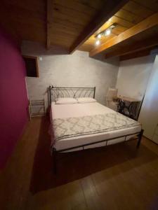 Postel nebo postele na pokoji v ubytování Casa Nikolou Halki