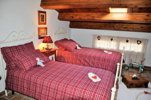 Postel nebo postele na pokoji v ubytování B&B Fonte Cugno