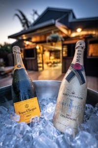two bottles of champagne in a bucket of ice at The Bangalow Barn in Bangalow