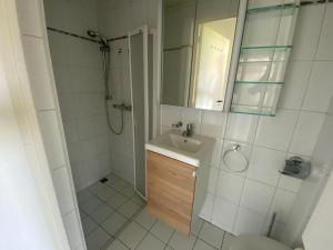 Ένα μπάνιο στο Appartement Walvis nr. 9D +12 φωτογραφίες