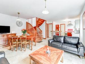 a living room with a couch and a table at Normandy Family Retreat in Brainville +32 photos