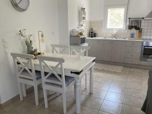 A kitchen or kitchenette at Villa in Loutra with Sea View and Pool