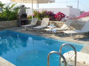 The swimming pool at or close to Villa in Loutra with Sea View and Pool