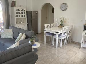 A seating area at Villa in Loutra with Sea View and Pool