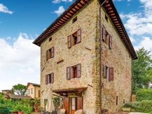 an old stone building with a blue sky in the background at Belvilla by OYO Welcoming Holiday Home with Pool in Monterchi