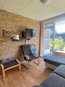 Et tv og/eller underholdning på Appartement Walvis nr. 22