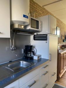 Køkken eller tekøkken på Appartement Walvis nr. 22