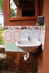 Ванна кімната в TAQUILE LODGE - Un lugar de ensueño