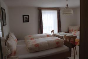 Łóżko lub łóżka w pokoju w obiekcie sonnberg