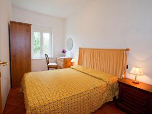 Ένα ή περισσότερα κρεβάτια σε δωμάτιο στο Holiday Home in Sesta Godano near Lake