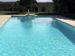 The swimming pool at or close to Charming holiday home with private pool