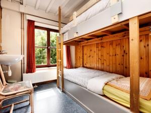 Letto o letti in una camera di Holiday Home in Rendeux near Nature Trails