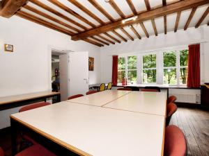 Area soggiorno di Holiday Home in Rendeux near Nature Trails