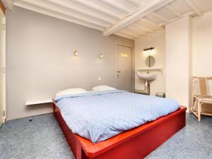 Letto o letti in una camera di Holiday Home in Rendeux near Nature Trails