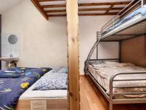 Letto o letti in una camera di Holiday Home in Rendeux near Nature Trails