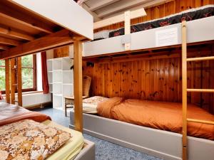 Letto o letti in una camera di Holiday Home in Rendeux near Nature Trails