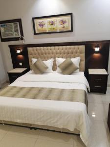 Ένα ή περισσότερα κρεβάτια σε δωμάτιο στο Dar Karim