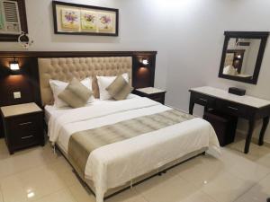 Ένα ή περισσότερα κρεβάτια σε δωμάτιο στο Dar Karim