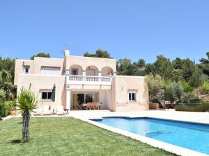 an image of a villa with a swimming pool at Belvilla by OYO Can Cova in Sant Josep