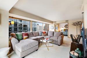 a living room with a couch and a table at Newmark Tower II in Seattle