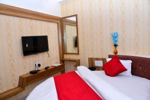 Postel nebo postele na pokoji v ubytování Hotel Asopalav