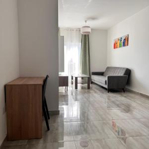 Posezení v ubytování F5 Room 1, Private Double room with private bathroom and balcony in shared Flat