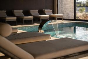 Bazén v ubytování San Servolo Wellness Homes nebo v jeho okolí