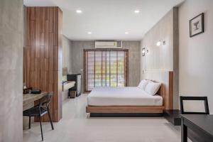 Una cama o camas en una habitación de Pirom Garden Private Villa