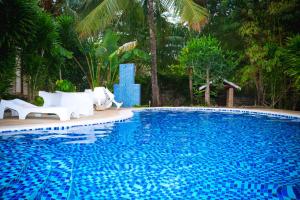 Photo de la galerie de l'établissement V-Szameitat Homes, à Diani Beach