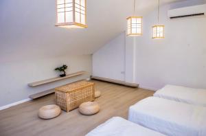Postel nebo postele na pokoji v ubytování Rumah Tetamu Bunk Bunk