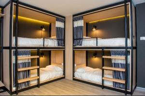 Postel nebo postele na pokoji v ubytování Rumah Tetamu Bunk Bunk