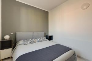 Postel nebo postele na pokoji v ubytování Giovannahouse