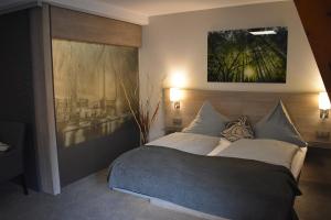 Postel nebo postele na pokoji v ubytování Hotel Neue Stuben