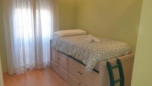 Postel nebo postele na pokoji v ubytování DS Casa con encanto junto a la Mezquita con cochera