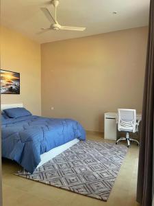 Postel nebo postele na pokoji v ubytování Al nayrouz chalet استراحة النيروز