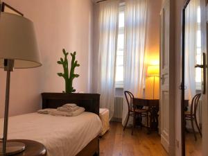 A bed or beds in a room at Le Porte di Marzo