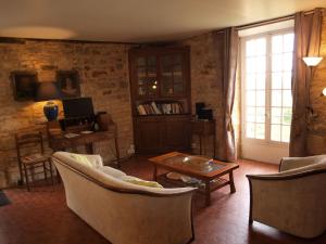 Cosy cottage in Peyzac le Moustier with Terraceにあるシーティングエリア