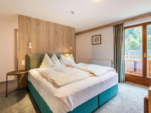 Posteľ alebo postele v izbe v ubytovaní Apartment in Wald near Zillertal Ski Area