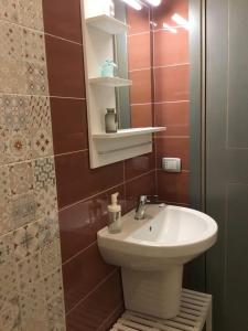 Koupelna v ubytování Appartamenti Rimembranze