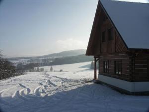 Spacious Holiday Home in Dlouh with Sauna v zimě