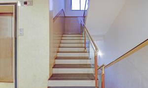 a set of stairs in a building at Treebo Suraksha Inn in Bengaluru
