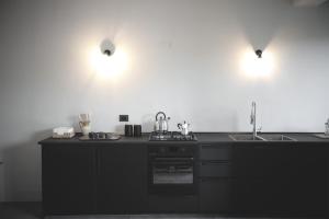 Η κουζίνα ή μικρή κουζίνα στο Casa Adele 3