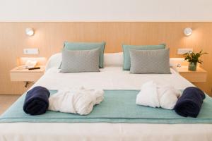 Llit o llits en una habitació de Gran Sagitario